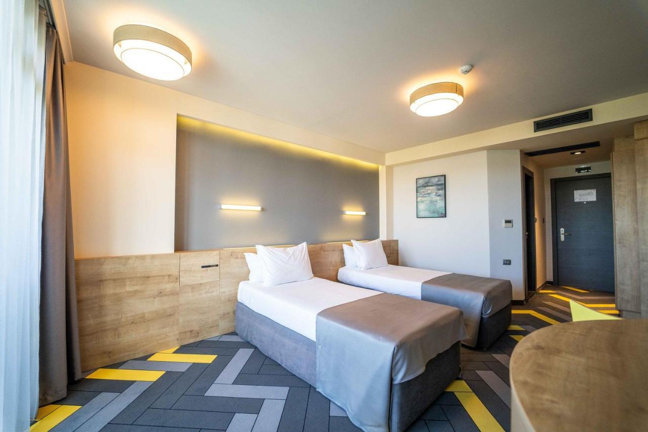 Zweibettzimmer Promo (2 Erwachsene + 1 Kind) - kostenfreie Minibar und Parkplatz