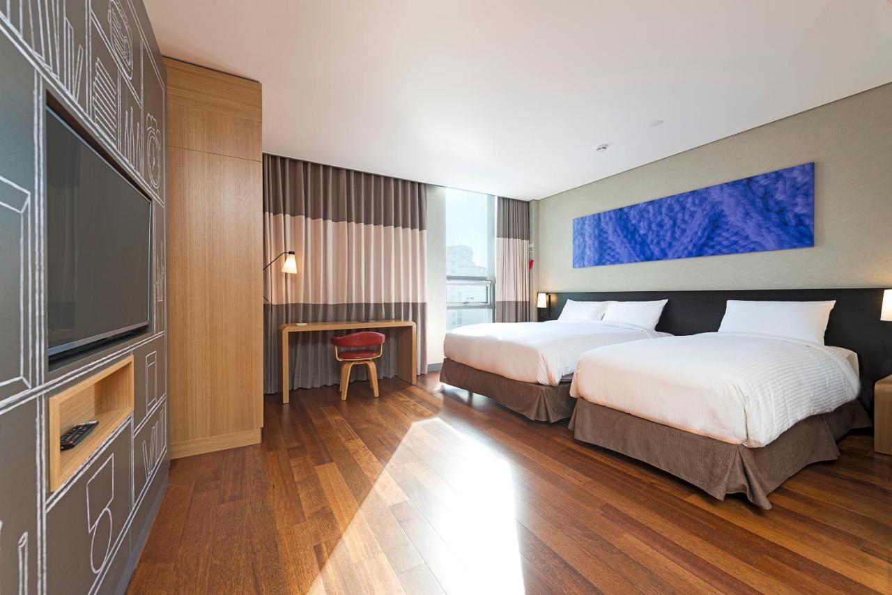 Deluxe Room with One Double and One Single Bed