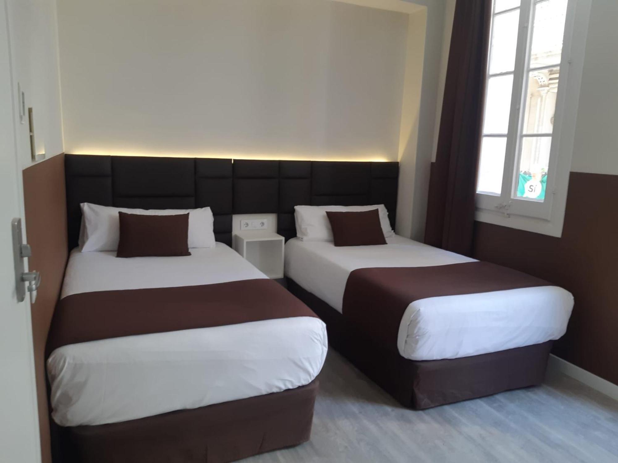 Tweepersoonskamer met 2 Aparte Bedden