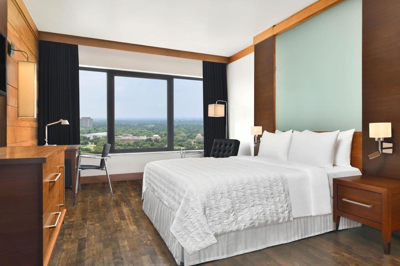 Club Zimmer, Club-Etage, Gästezimmer, 1 Queensize-Bett, Stadtblick – Flughafentransfer (Hin- und Rückfahrt), Zugang zur Club-Lounge mit High Tea von 15:00 bis 17:00 Uhr, Happy Hour von 18:00 bis 20:00 Uhr