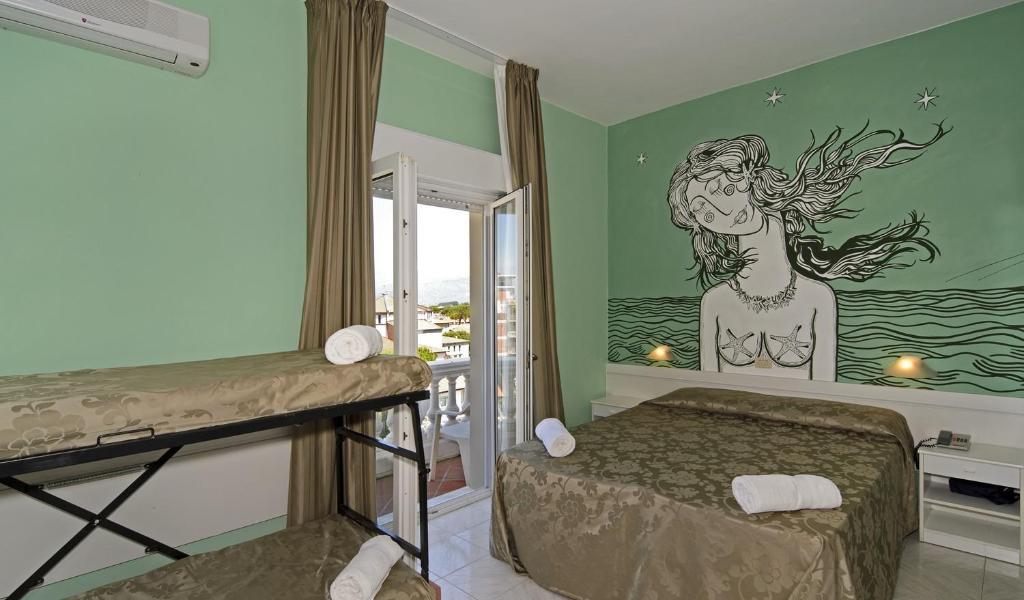 Quadruple Room Balcony Partial Sea View,27891590:JPEG