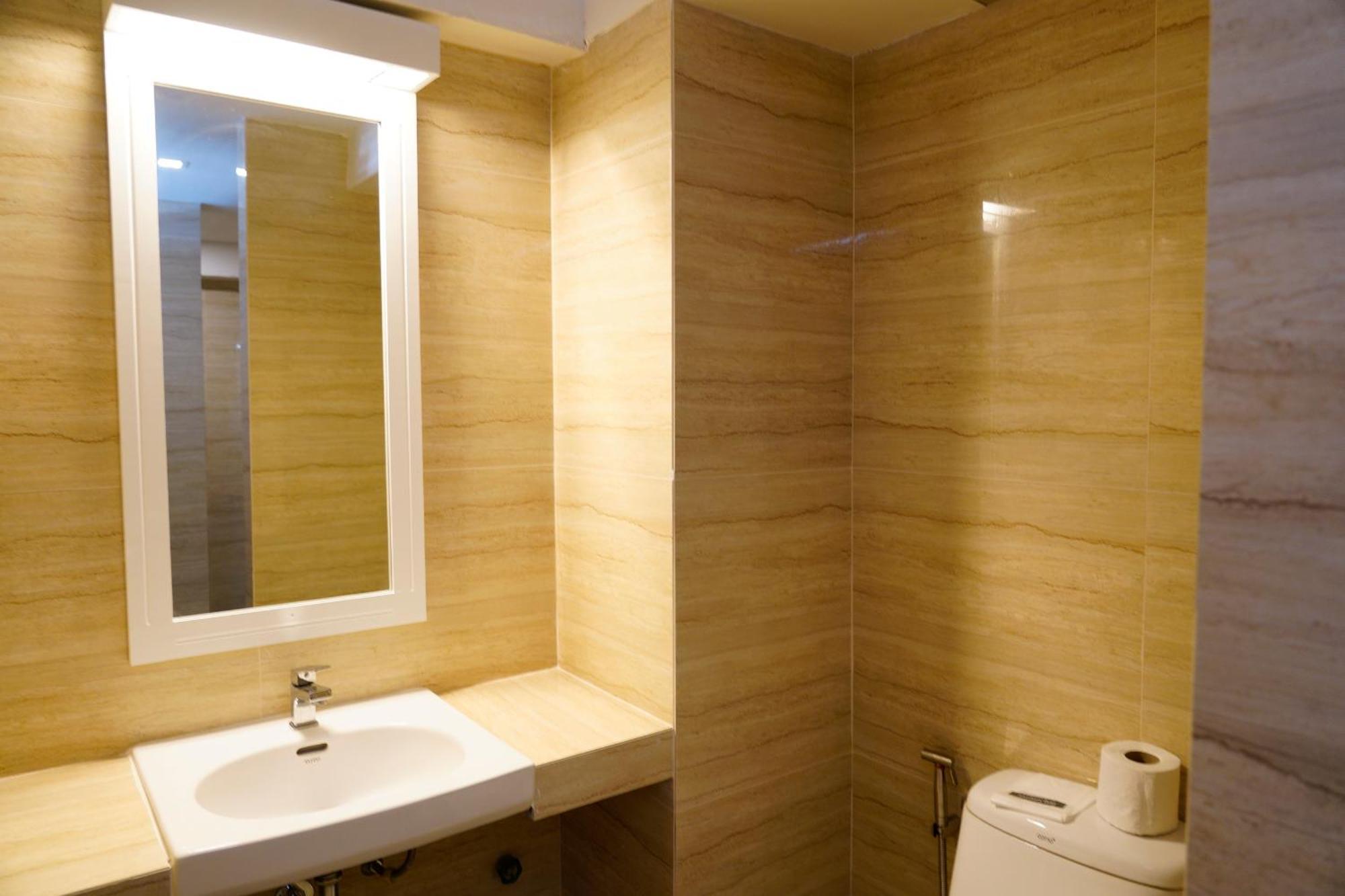 Deluxe Dreibettzimmer mit Fenster