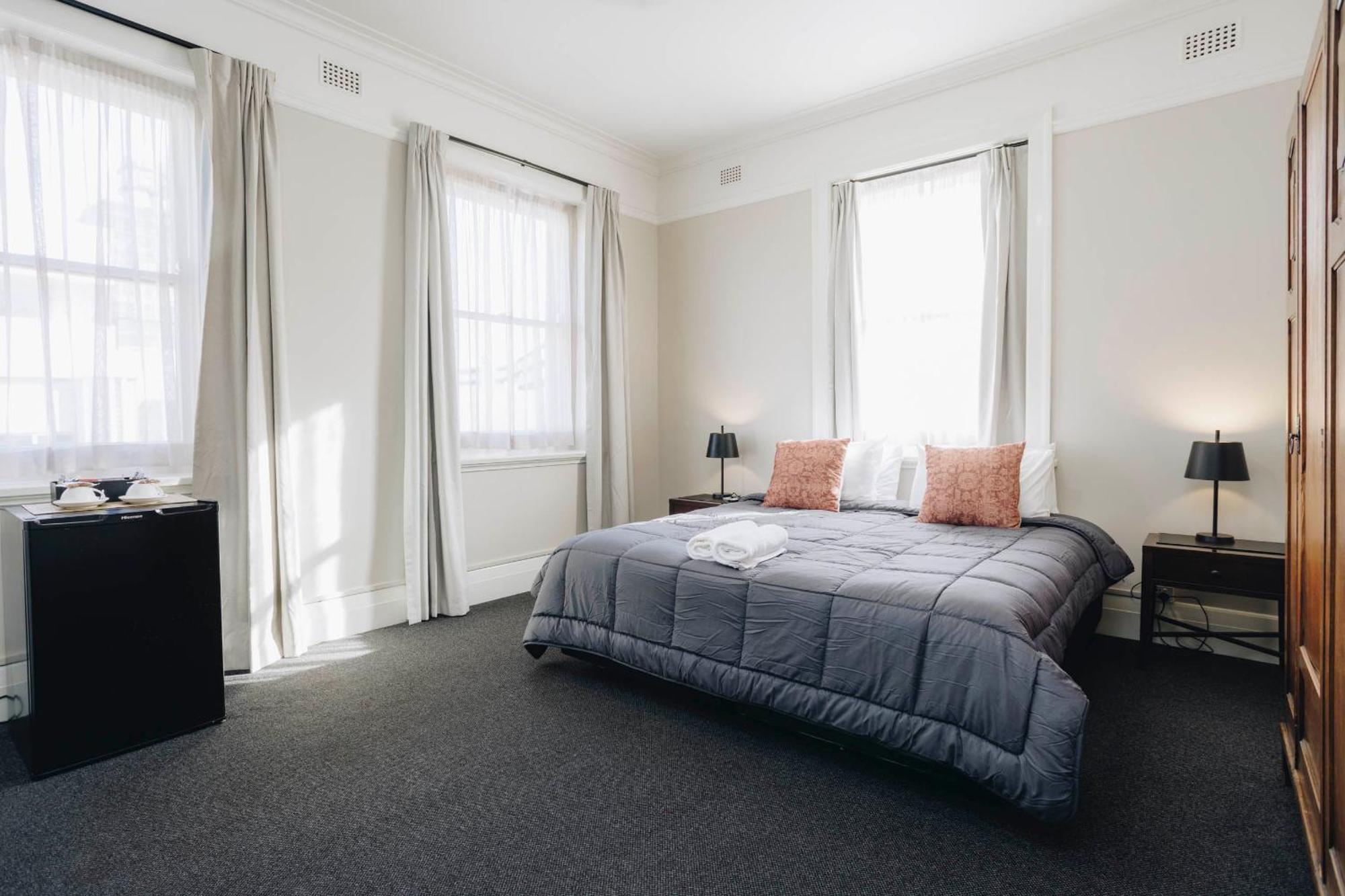 Deluxe King Room with Shared Bathroom