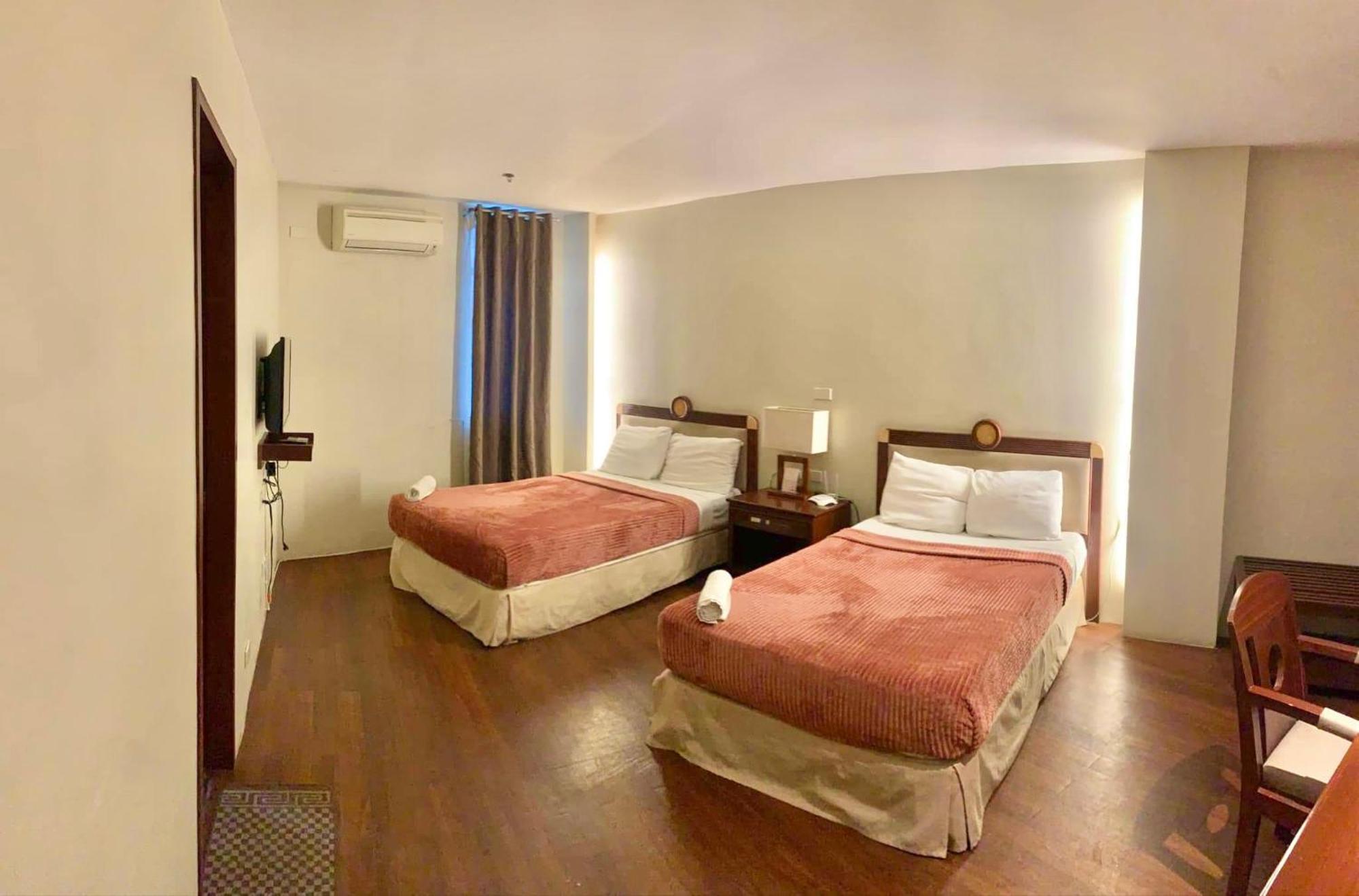 Quarto Deluxe com Cama de Casal ou 2 de Solteiro