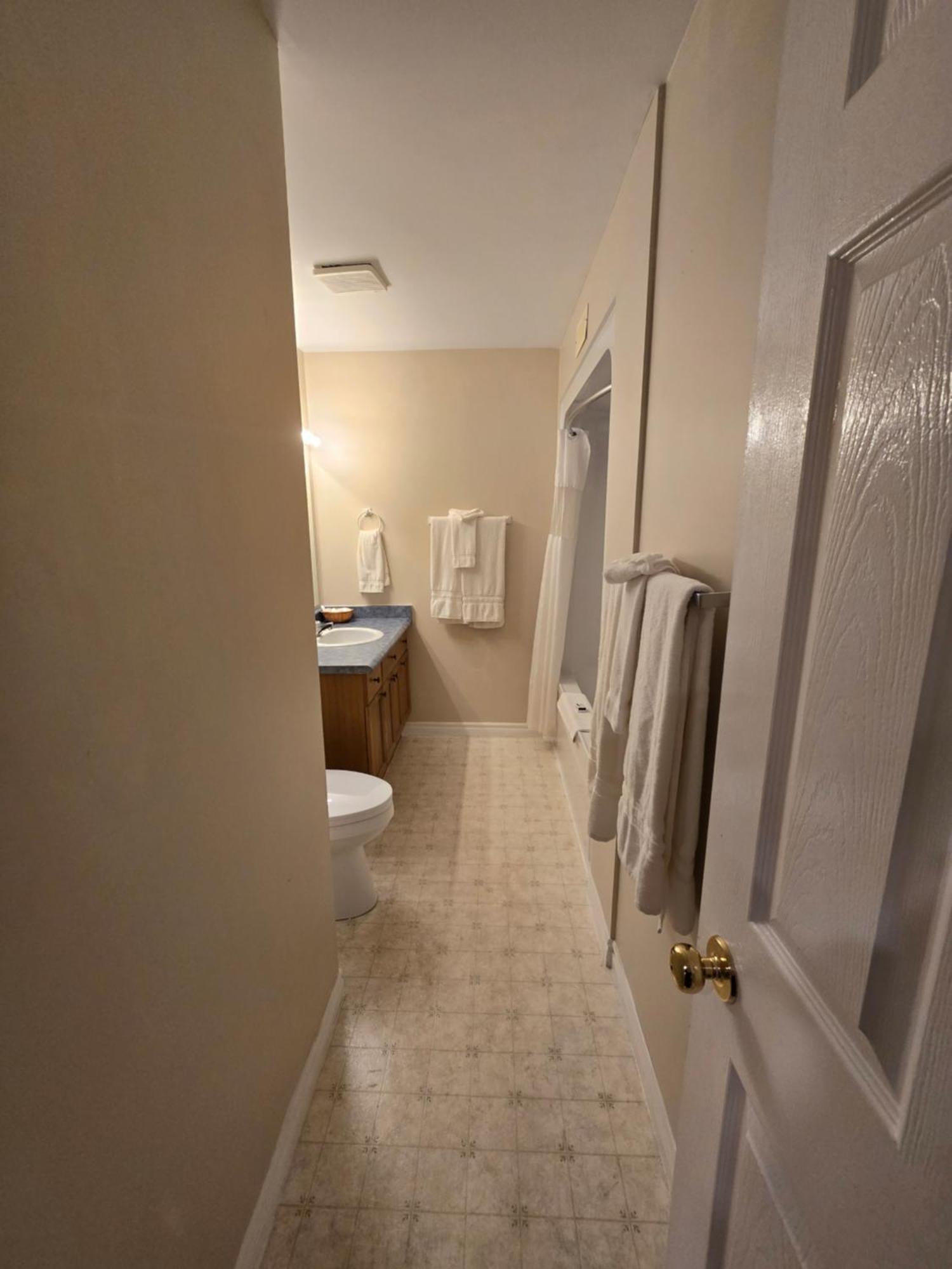 Room with One King and One Queen Bed - Pool Access/Non-Smoking