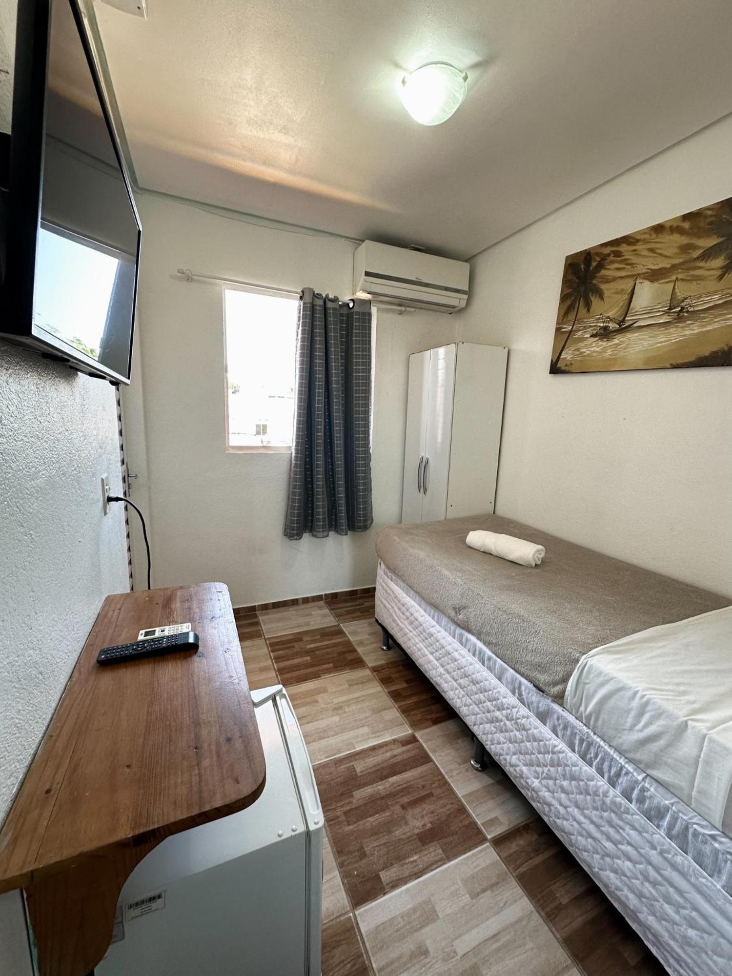 Quarto Individual Econômico