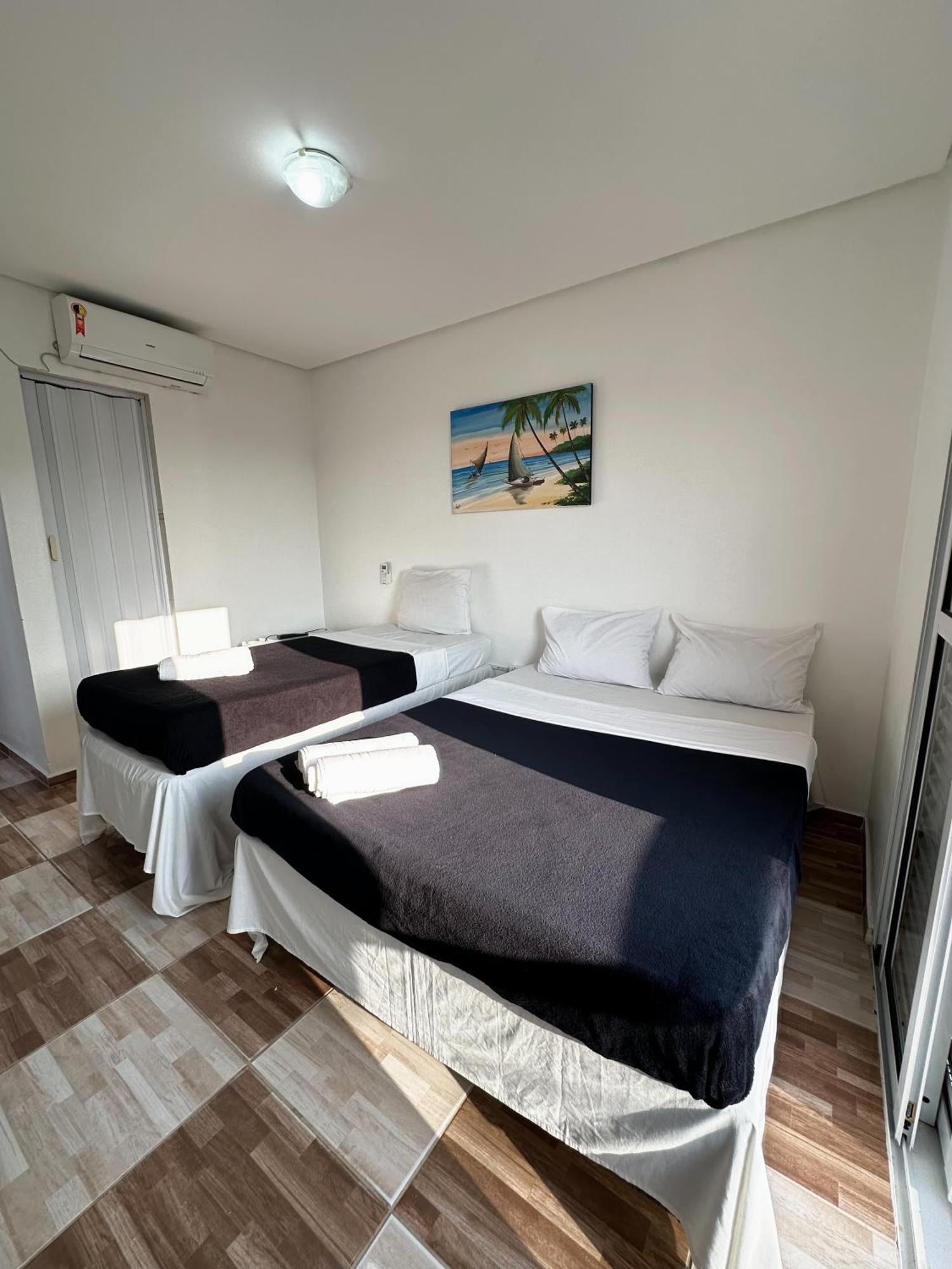 Quarto Triplo com Varanda