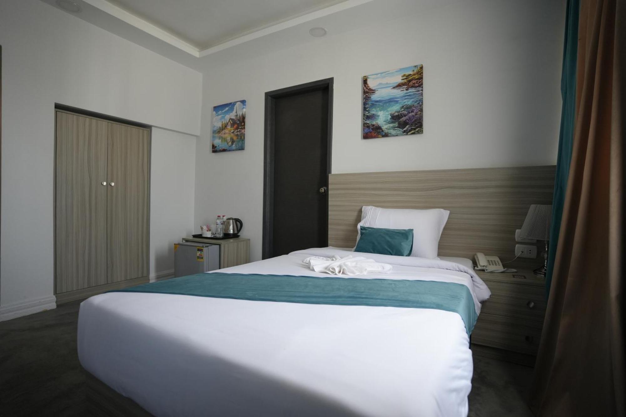 Habitación Doble Superior - 1 cama extragrande o 2 individuales
