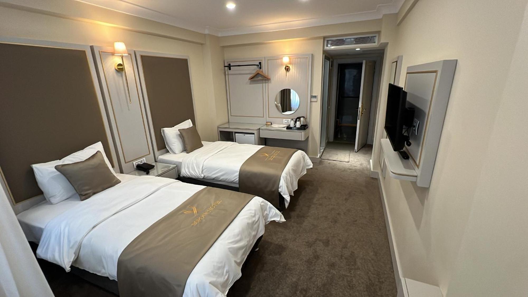 Tweepersoonskamer met 2 Aparte Bedden