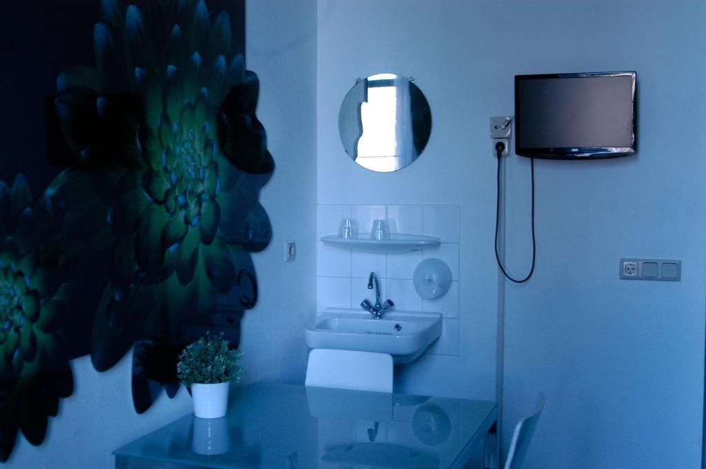 Chambre Lits Jumeaux avec Salle de Bains Commune