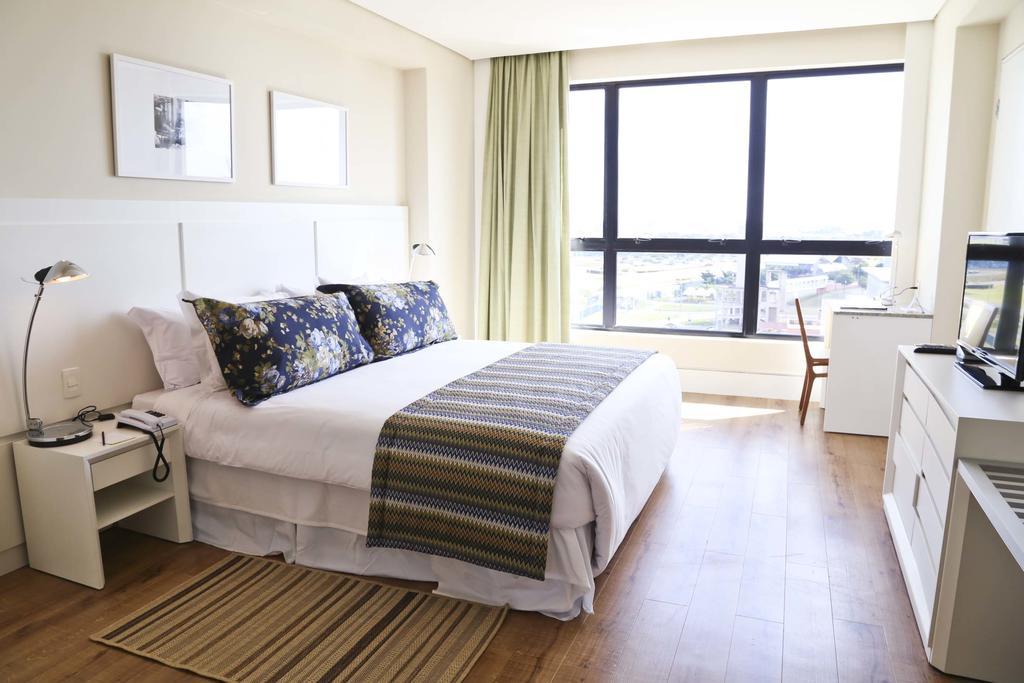 Quarto Duplo com Banheira de Hidromassagem