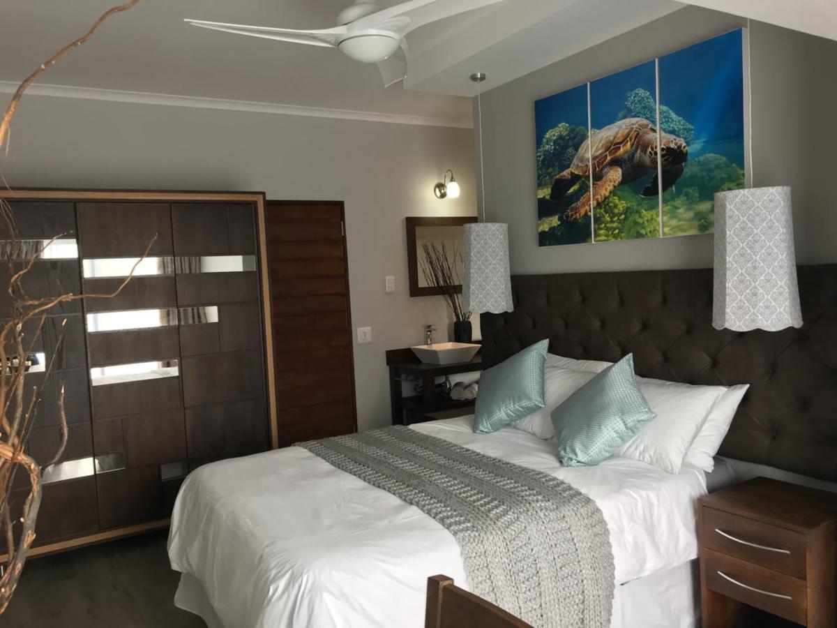 Kamer met Queensize Bed en Gedeelde Patio