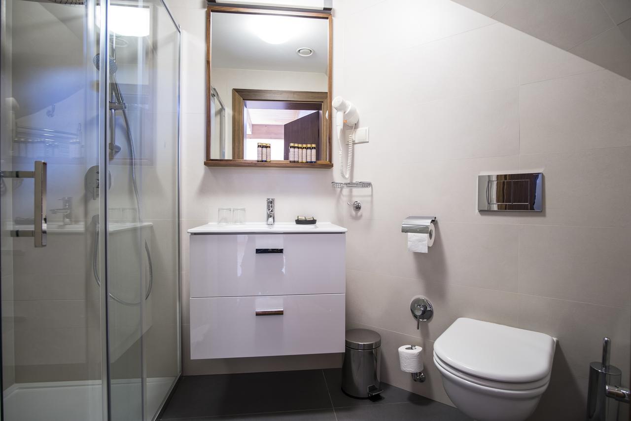 Deluxe Quadruple Room with Balcony