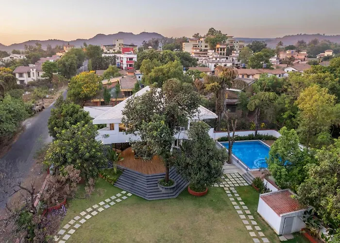 Grey Medley By Stayvista With Mediterranean Interiors, Swimming Pool, Jacuzzi, Projector & A Lush Lawn With Gazebo
