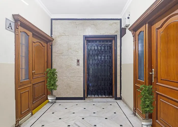 Capital O Samrat Palace Near Nampally Station
