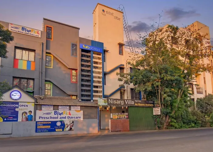 Hotels With Four Stars Fabhotel Nisarg Villa