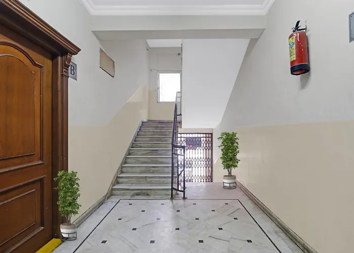 Capital O Samrat Palace Near Nampally Station